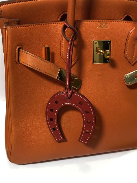 bag charm hermes|hermes leather charms.